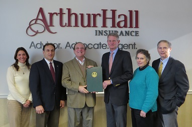 Senator Dinniman presents the agency principals of Arthur Hall Insurance with a special Senate citation in honor of the company’s 50th anniversary. Pictured (from left to right): Nicole Grebloskie, Vice President, Personal Lines; Mark Sammarone, Vice President; Dinniman; Jim Denham, President; Karen Leary, Operations Manager; and Glenn Burcham, Senior Vice President, Delaware Operations. 